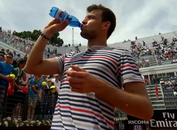 Dimitrov beats sweaty palms and survives Roger-Vasselin to reach the second round in Rome