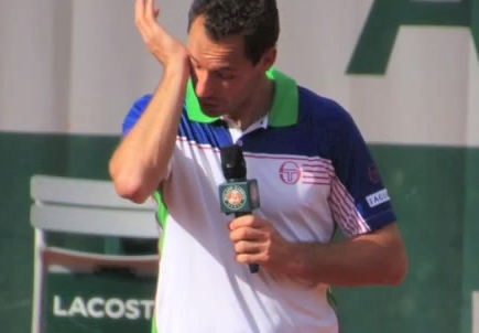 Llodra receives honors after playing last match at the French Open