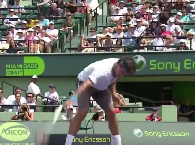 federer smashing racket