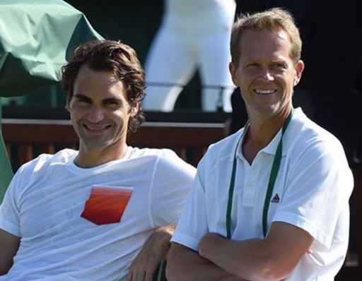 Federer splits with Edberg
