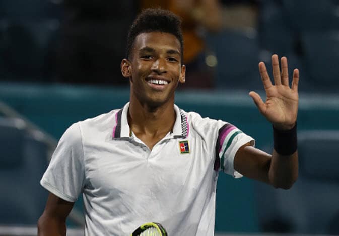 Auger-Aliassime makes history, sets up Isner semi in Miami