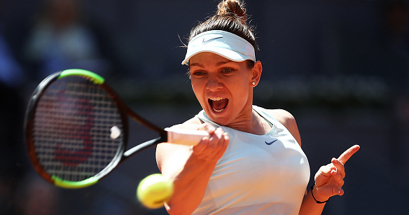 Halep beats Barty