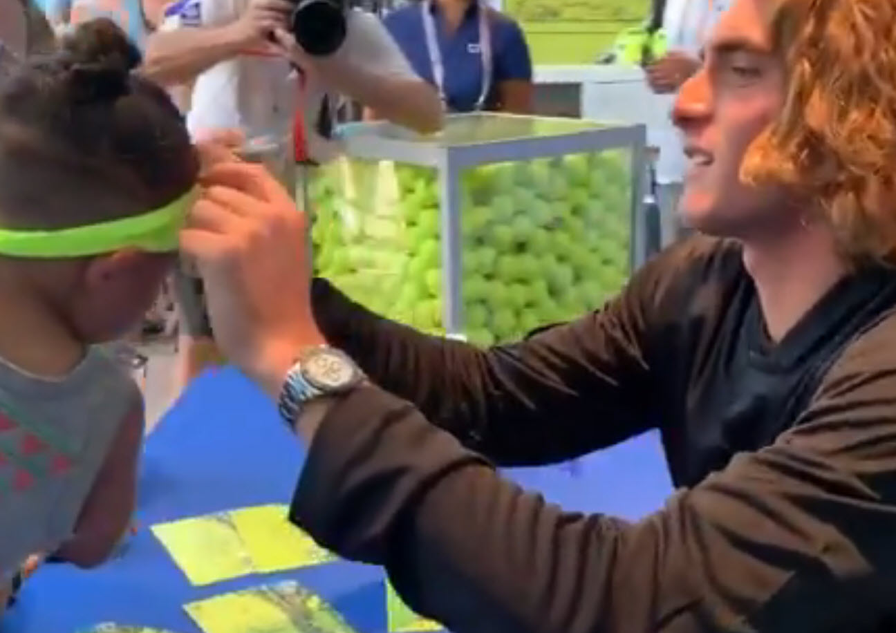 Citi Open. Stefanos Tsitsipas and a kid
