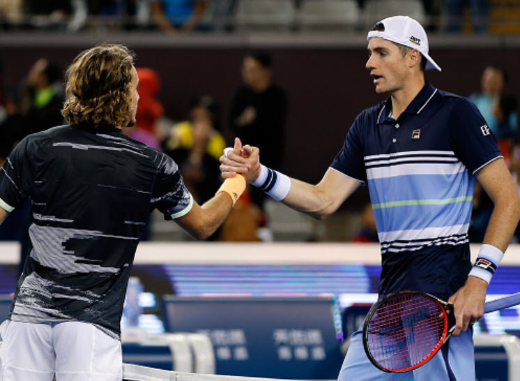 Face Masks. Stefanos Tsitsipas And John Isner On A Rather Different 