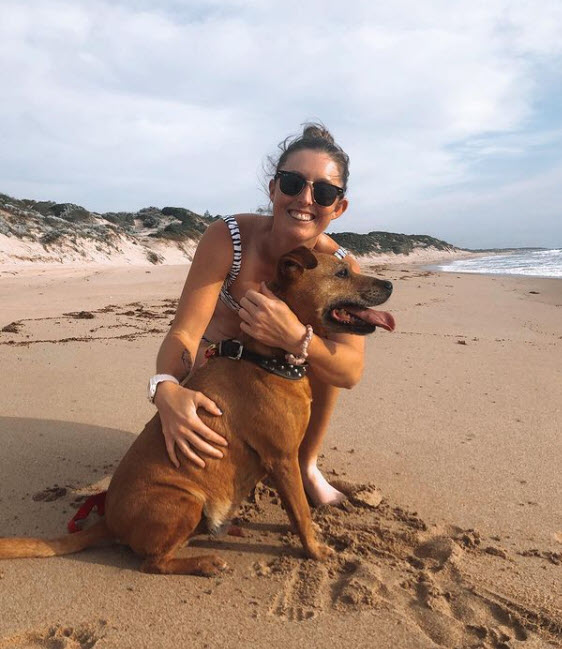 Storm Sanders With Her Dog At The Beach