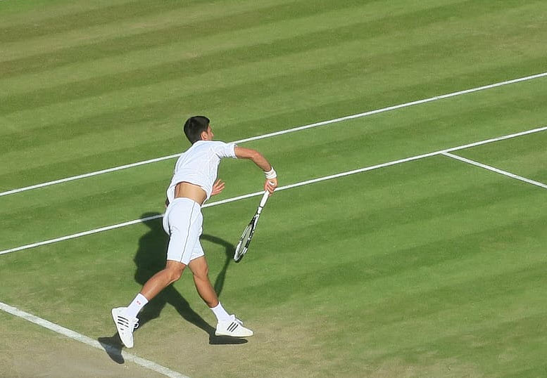 Djokovic Playing On Grass