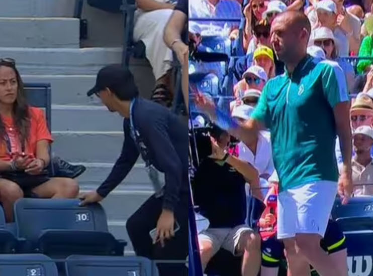 Spectators Box Dan Evans pushes a fan off his box as his match against Carlos Alcaraz ...