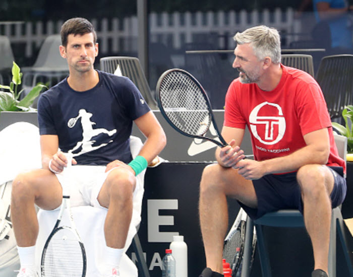 Djokovic Sits With His Coach
