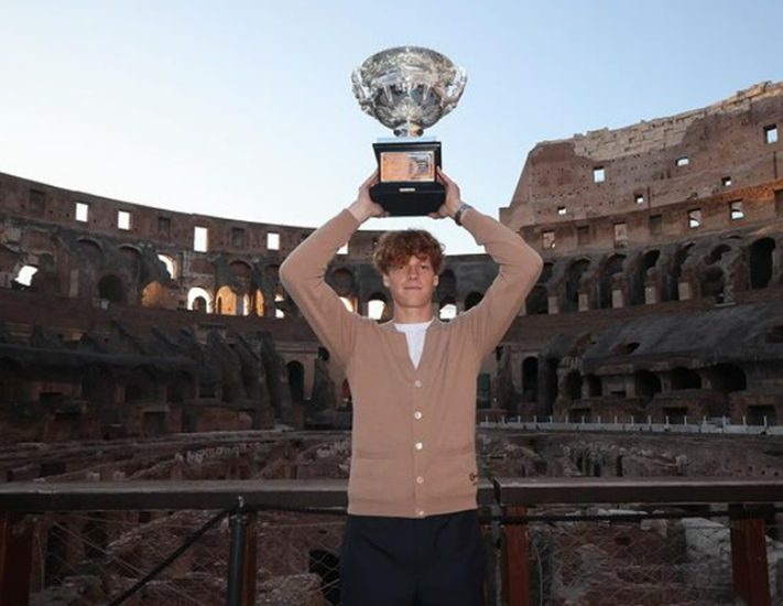 Sinner Holding The Trophy