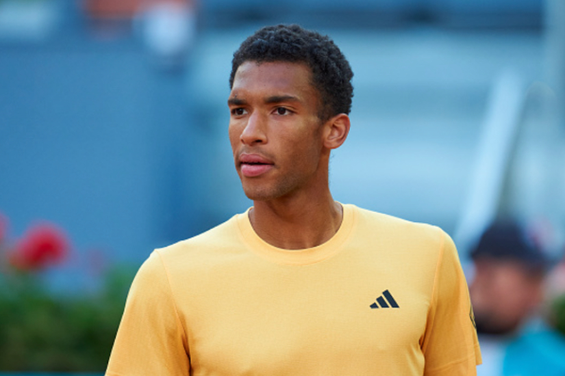 Felix Auger Aliassime reacts to reaching the Madrid final after Lehecha’s retirement