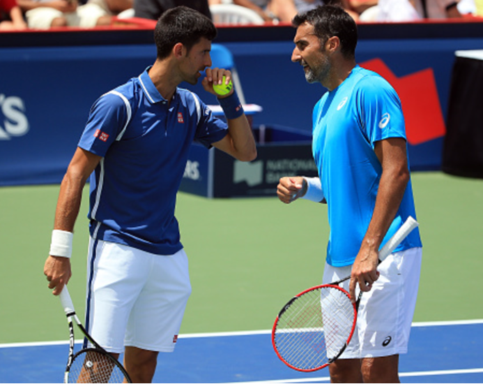 Djokovic With Coach