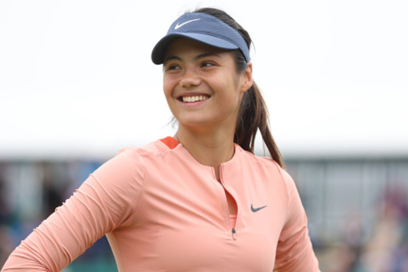 Emma Raducanu's improved serve propels her to first grass court quarter