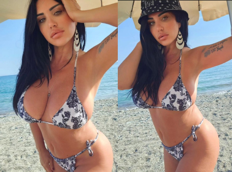 Italian reporter looks Marika Fruscio looks amazing at the beach in a bikini.