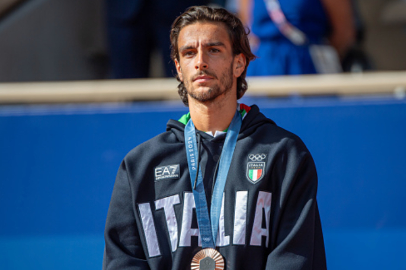 Lorenzo Musetti Celebrates Bronze Medal Victory With Well Deserved Pizza