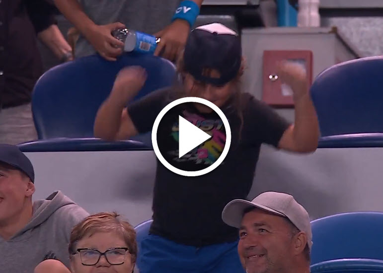 Young tennis fan steals the show with her moves on Rod Laver Arena during the changeover