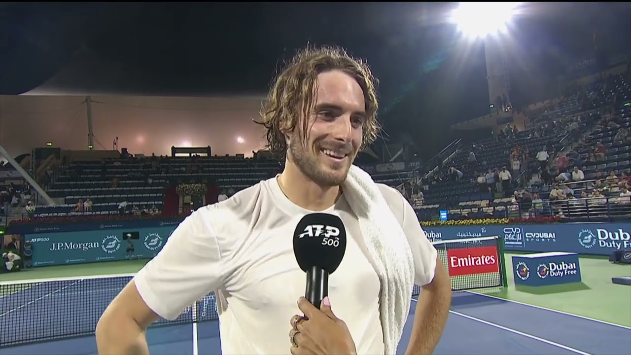 Tsitsipas playing with a new blacked out racket saying that “balls and courts becoming slower and slower”