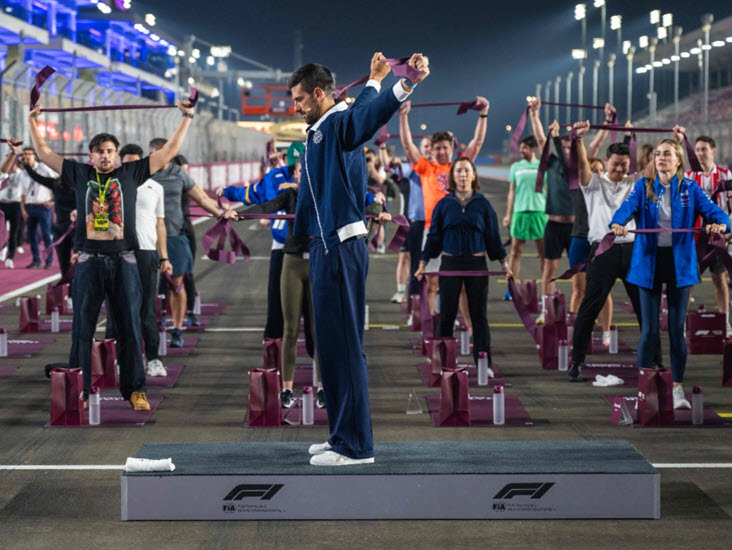 Djokovic entertains fans with yoga moves at Lusail International Circuit ahead of Formula 1 race Djokovic Joga
